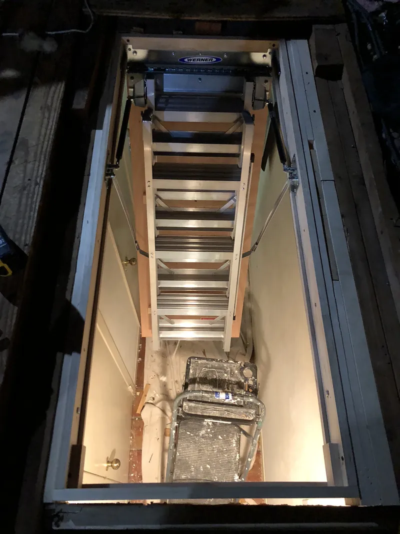 Attic access ladder