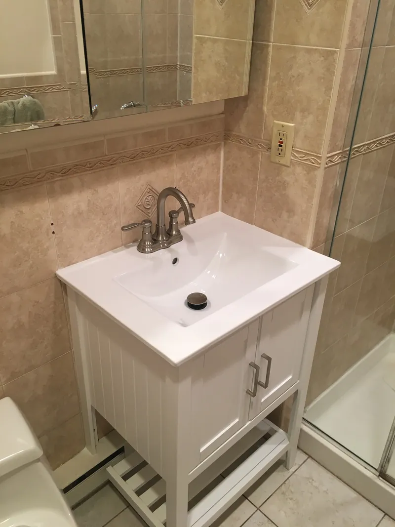 Vanity beside a shower