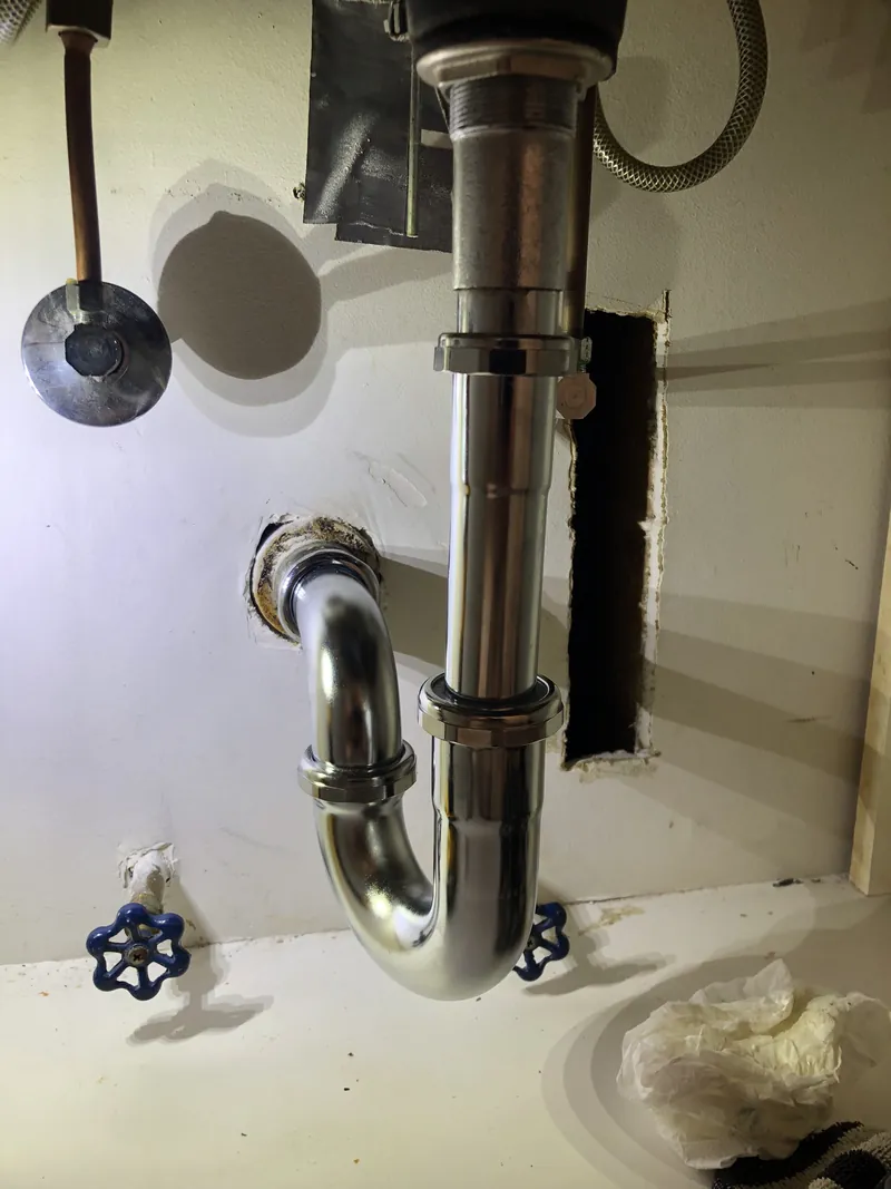 Drain trap and connections
